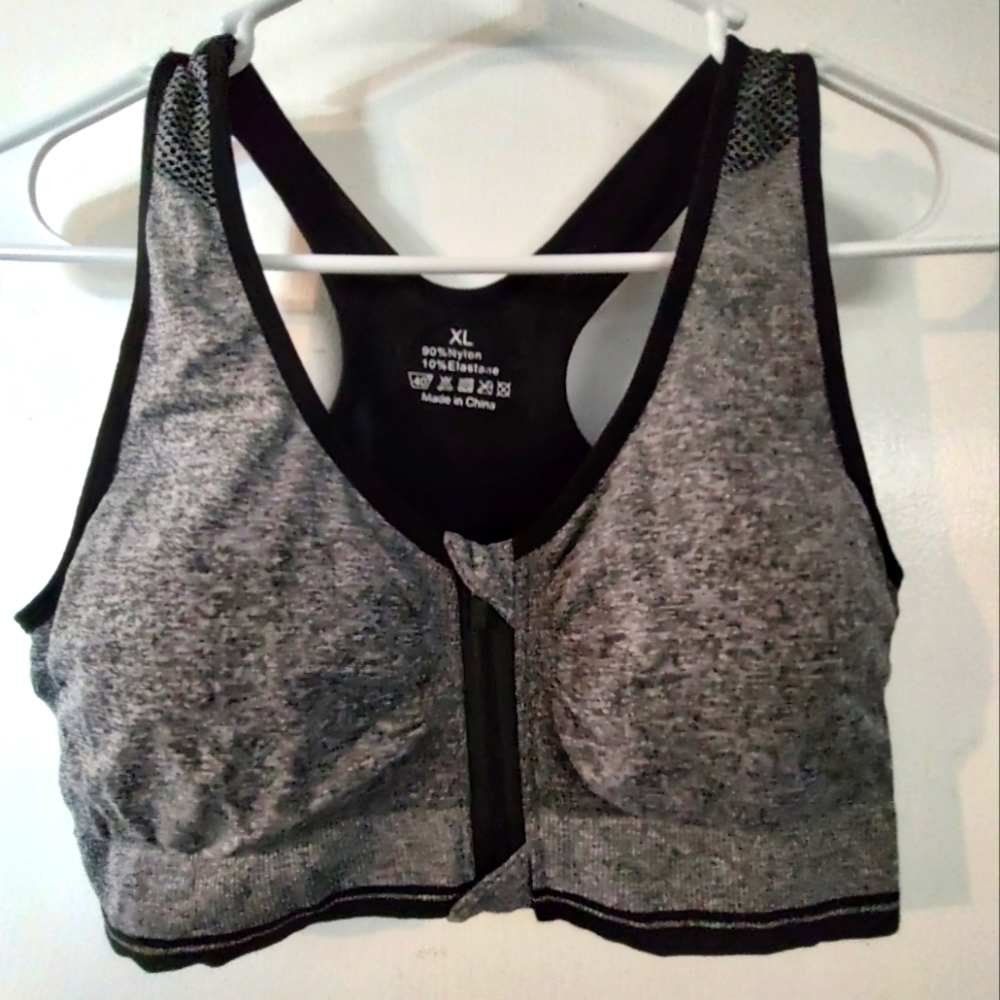 Front zip sports bra. New. XL